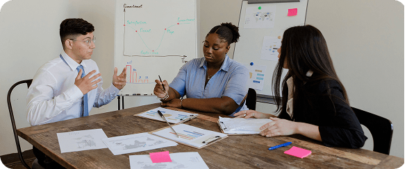 Marketing team identifying strategic gaps using enterprise AI insights during a planning session