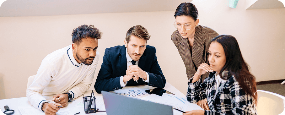 Executive team reviewing a real-time performance report together, powered by contextual intelligence